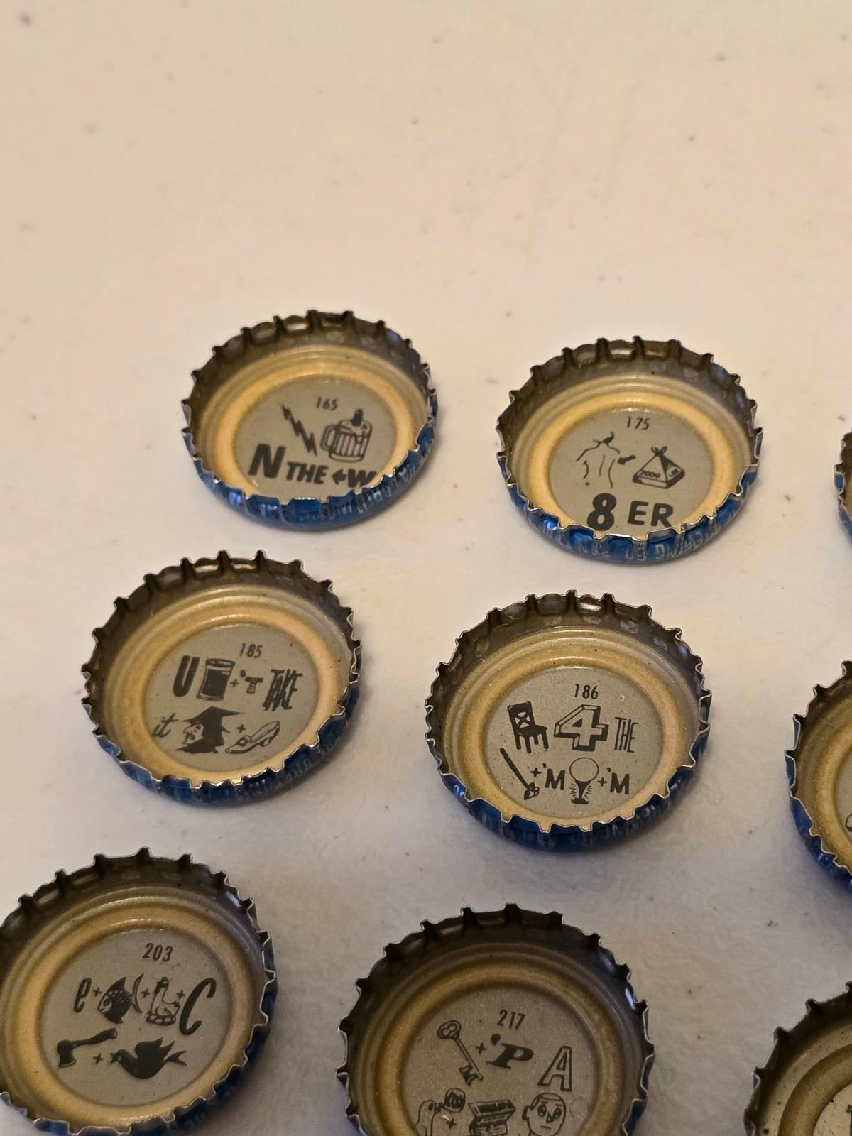 Set of 10 Lucky Lager Rebus/Puzzle Bottle Caps - Blue & Silver