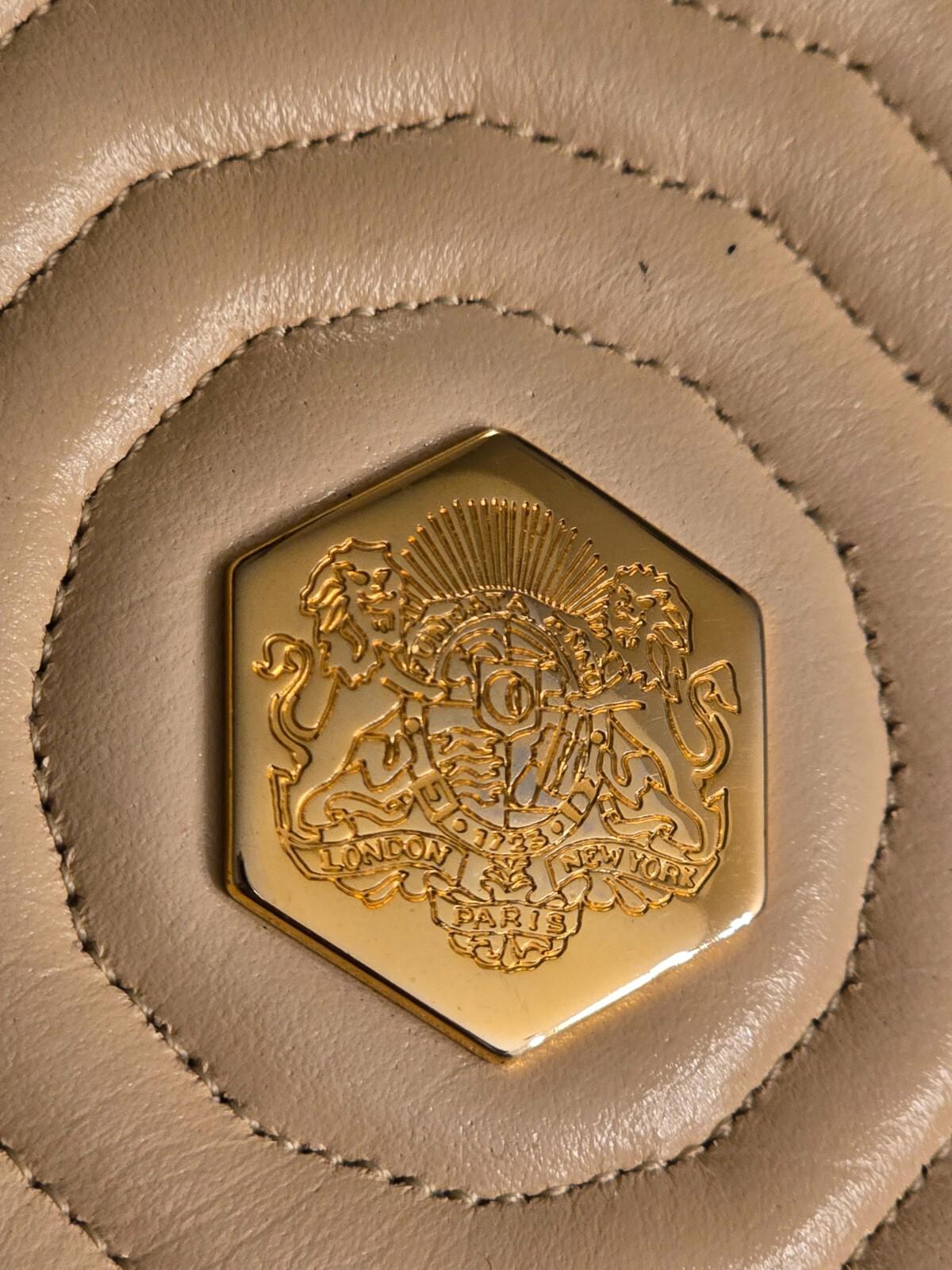 Revillion Quilted Leather Purse