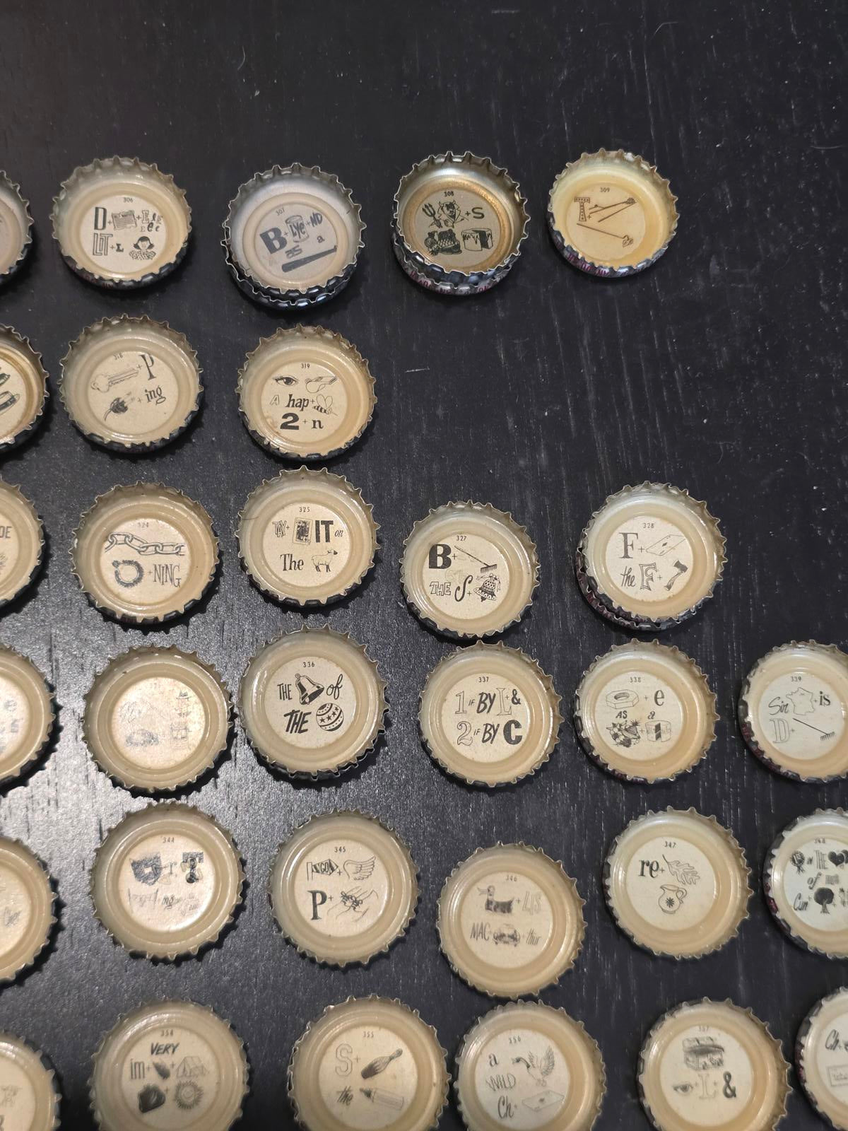 Set of 122 Lucky Lager Rebus/Puzzle Bottle Caps - Silver w/ Red Script