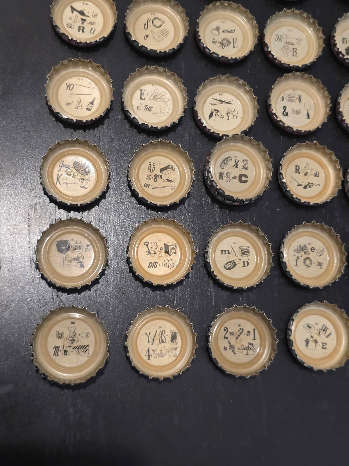 Set of 122 Lucky Lager Rebus/Puzzle Bottle Caps - Silver w/ Red Script