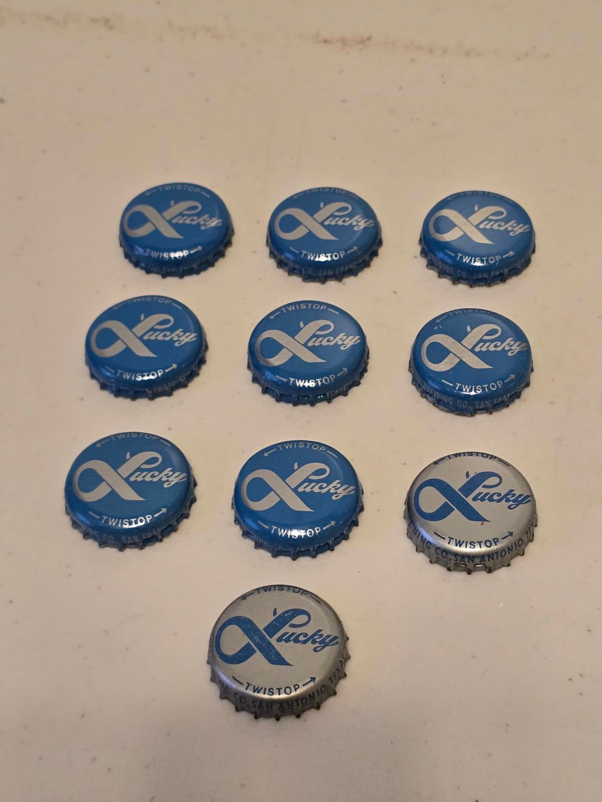 Set of 10 Lucky Lager Rebus/Puzzle Bottle Caps - Blue & Silver