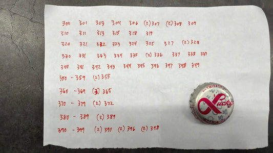 Set of 122 Lucky Lager Rebus/Puzzle Bottle Caps - Silver w/ Red Script