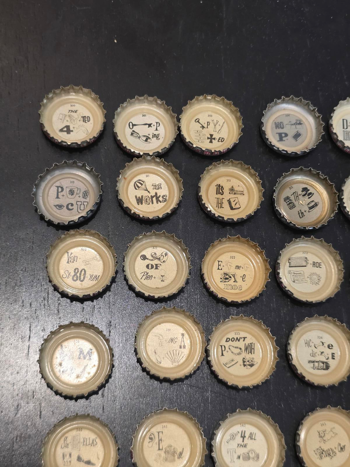 Set of 122 Lucky Lager Rebus/Puzzle Bottle Caps - Silver w/ Red Script