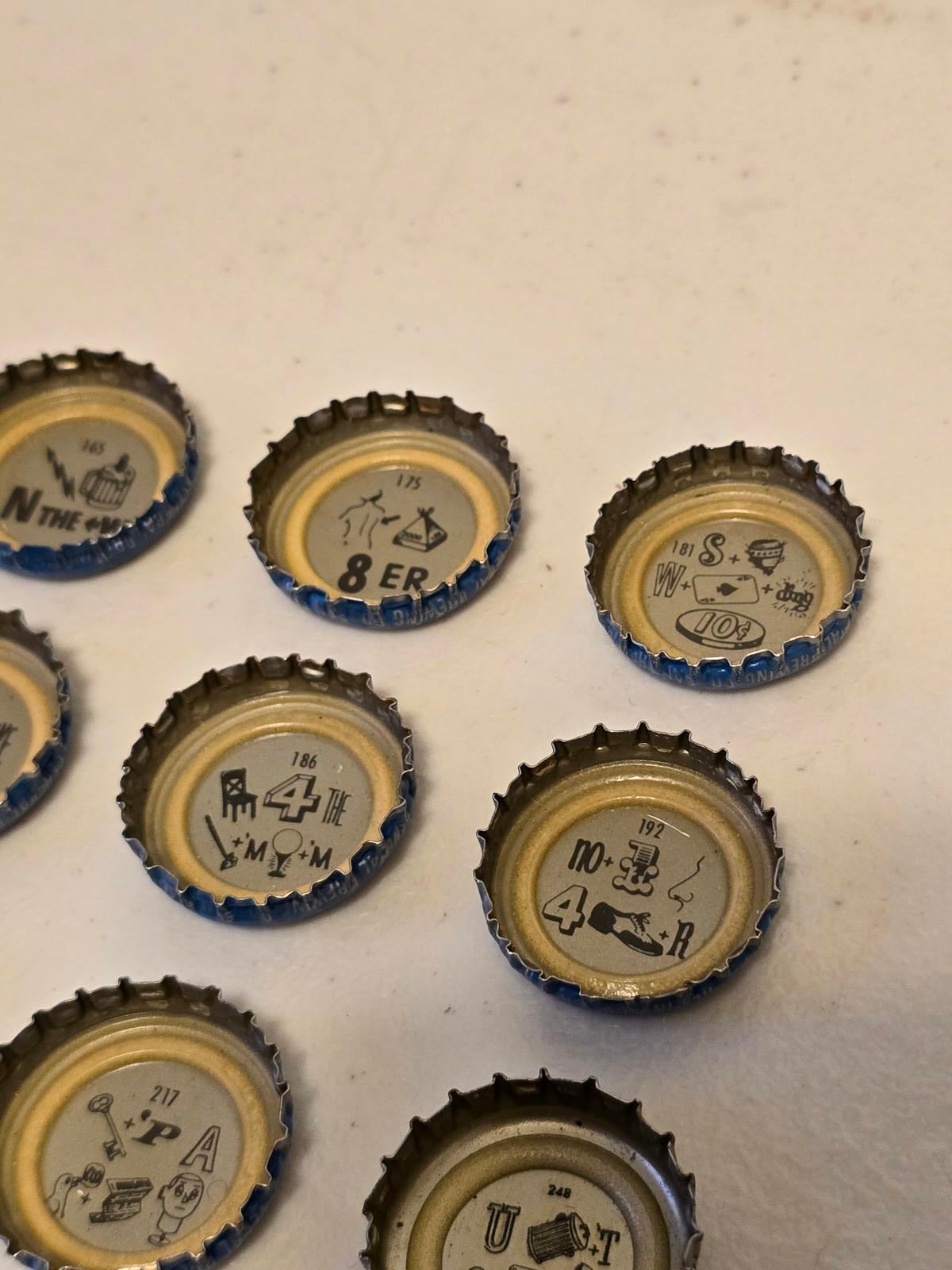 Set of 10 Lucky Lager Rebus/Puzzle Bottle Caps - Blue & Silver