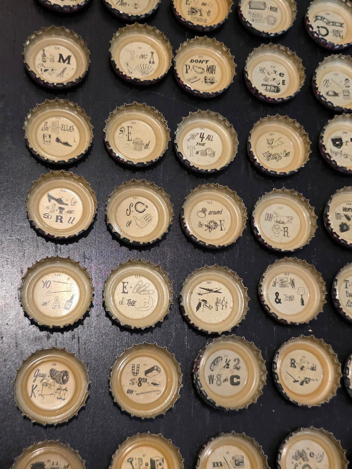 Set of 122 Lucky Lager Rebus/Puzzle Bottle Caps - Silver w/ Red Script