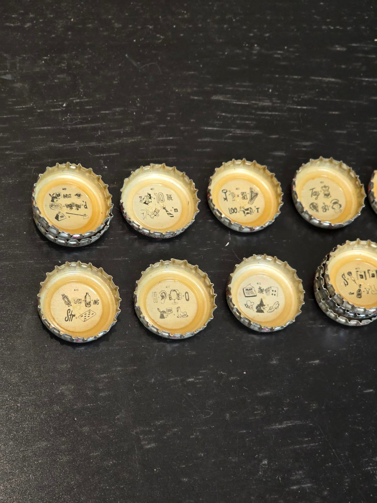 Set of 122 Lucky Lager Rebus/Puzzle Bottle Caps - Silver w/ Red Script